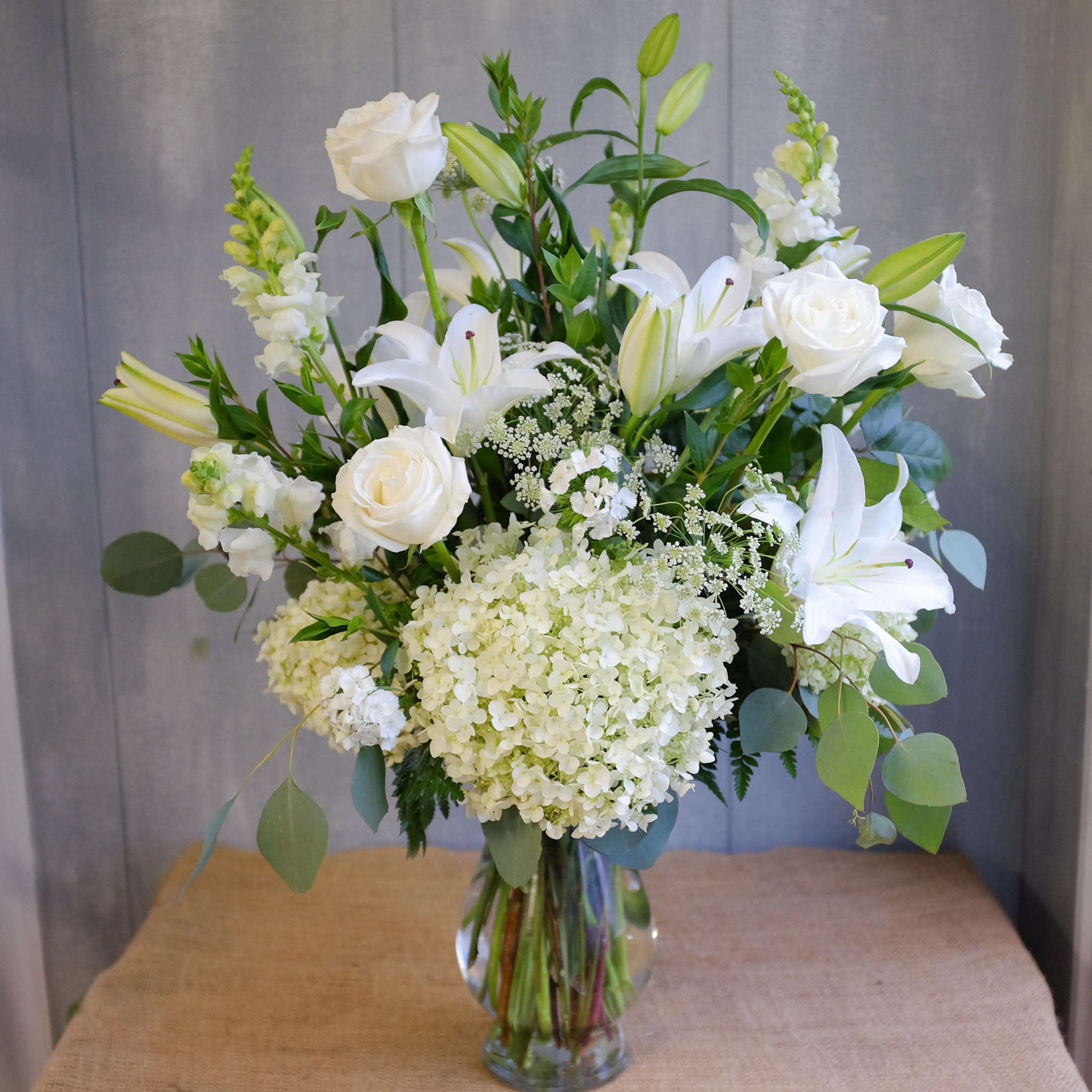 White flower vase arrangement by Michlers Florist