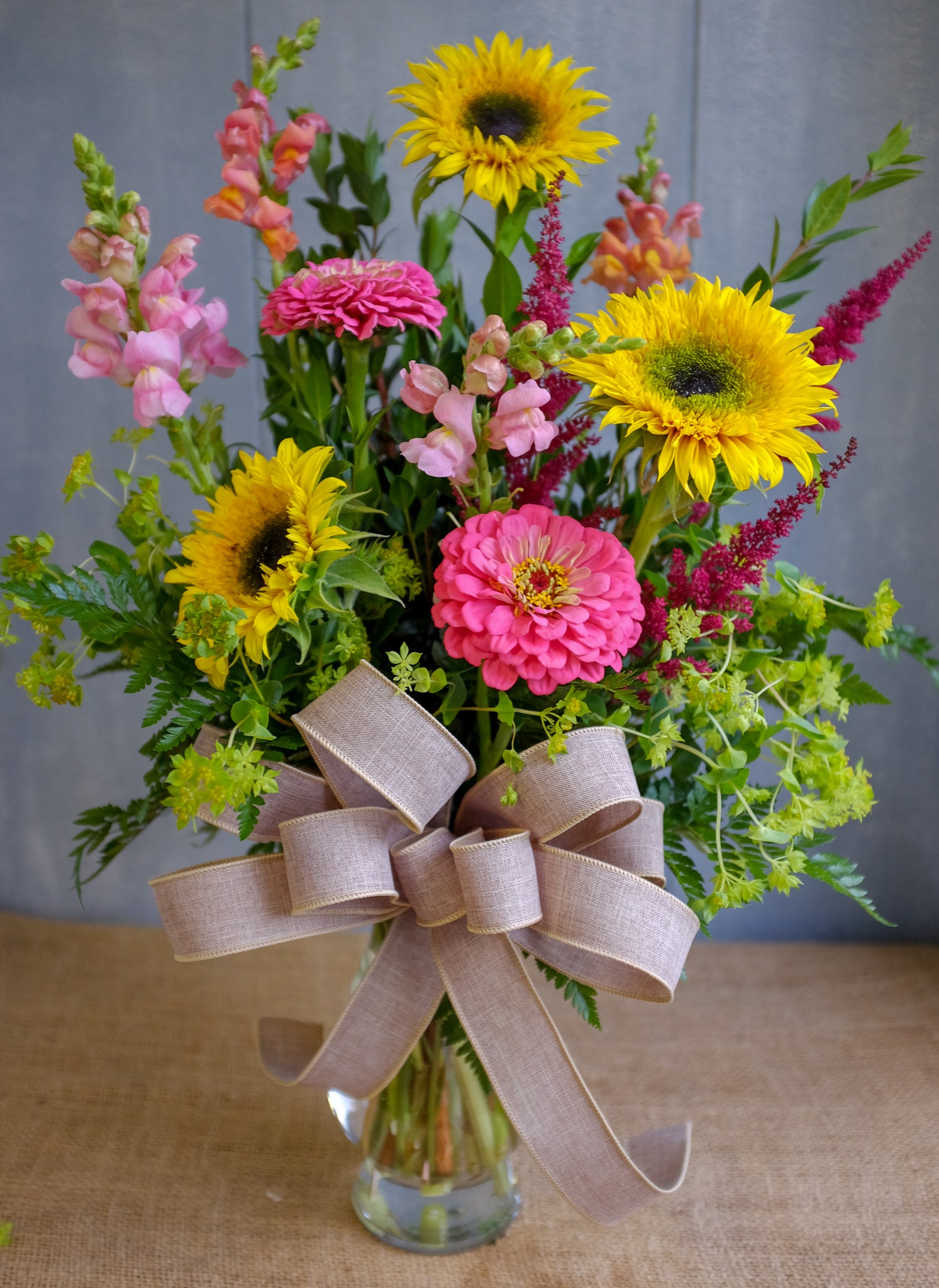 Floral bouquet with summer flowers, sunflowers, snapdragons, and zinnas by Michler's Florist