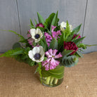 Carmona Flower Arrangement with Hyacinth, Anemones and Tulips by Michler's Florist