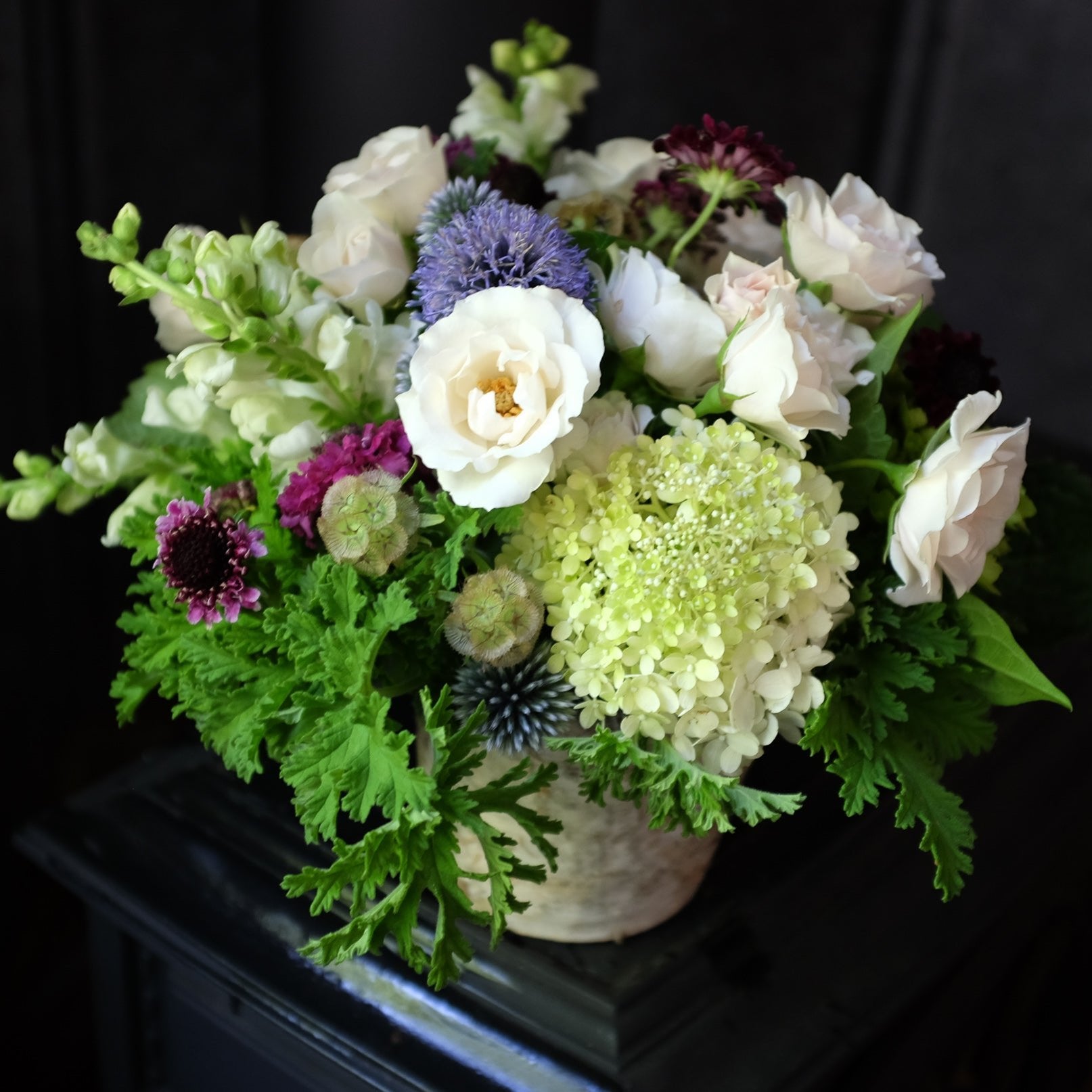Flower design with Scabiosa, Scented Geraniums, Globe thistle | Michler's Florist