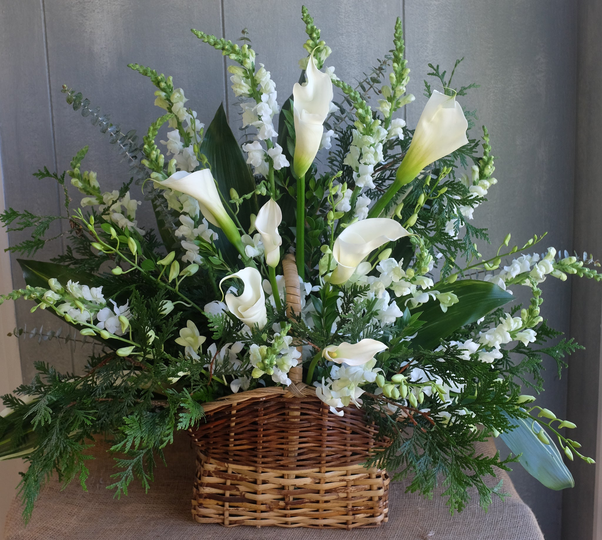 Symphony Basket l White floral spray designed by Michler's Florist