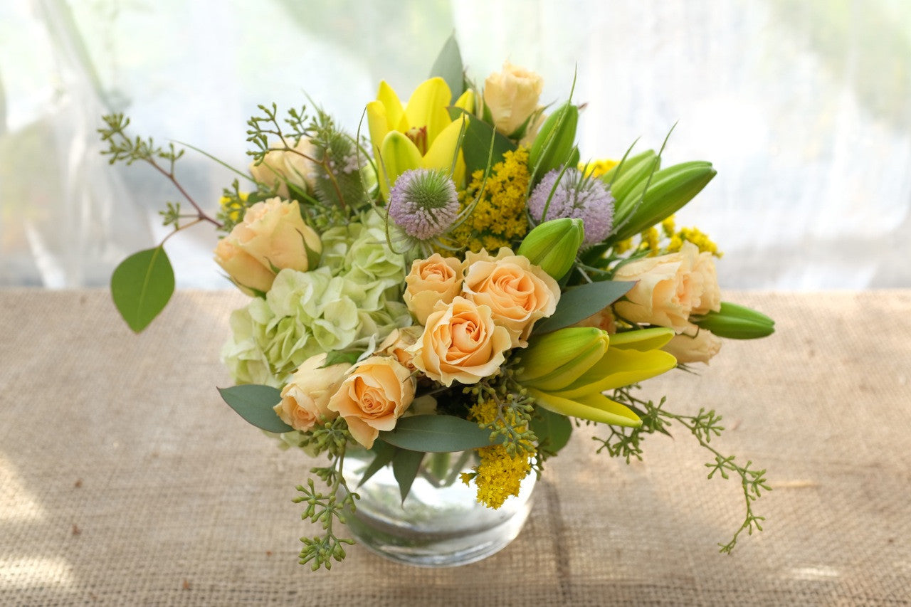 Waveland Flower Design with Thistle, Lilies, Spray Roses and Hydrangea. Designed by Michler's Florist in Lexington, K