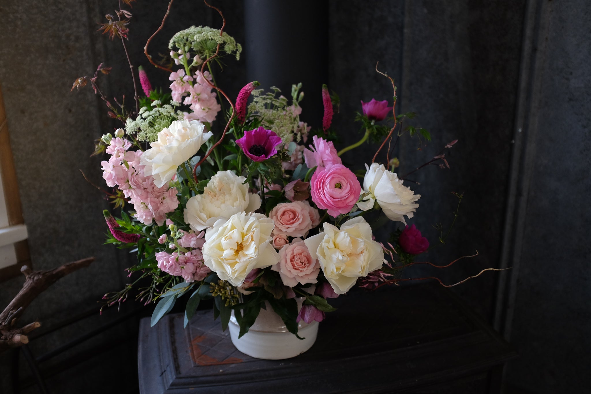 Atwood Flower Bouquet with Maple Branches, Hellebore, and Garden Roses by Michler's Florist