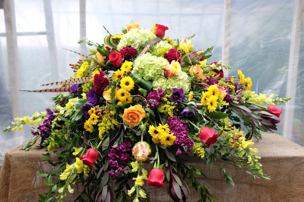 Casket Spray with Autumn Tones. Michler's Florist, Greenhouses & Garden Design