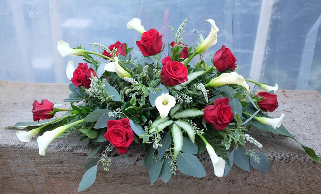 Brittany: Sympathy Flower Arrangement with Red Roses and Calla Lilies. Designed by Michler's Florist in Lexington, KY