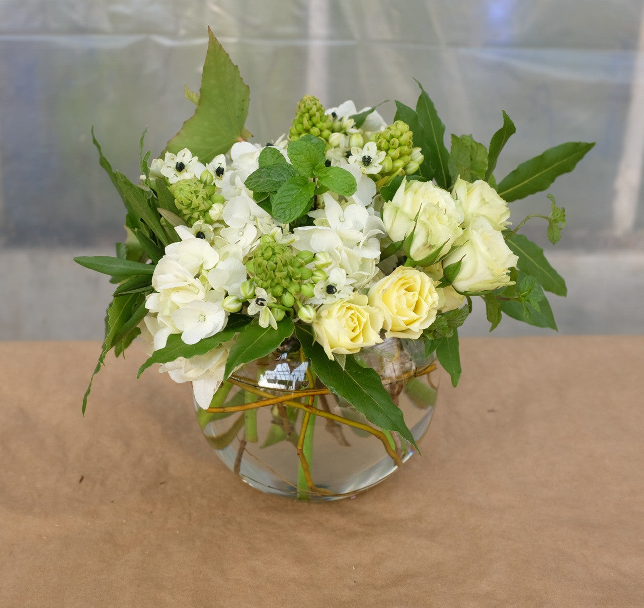 Buttercream: Flower Arrangement with white Hydrangea, Cream Roses and Star of Bethlehem.  Designed by Michler's Florist in Lexington, KY