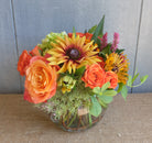 Flower bouquet in a warm and spicy color palette.