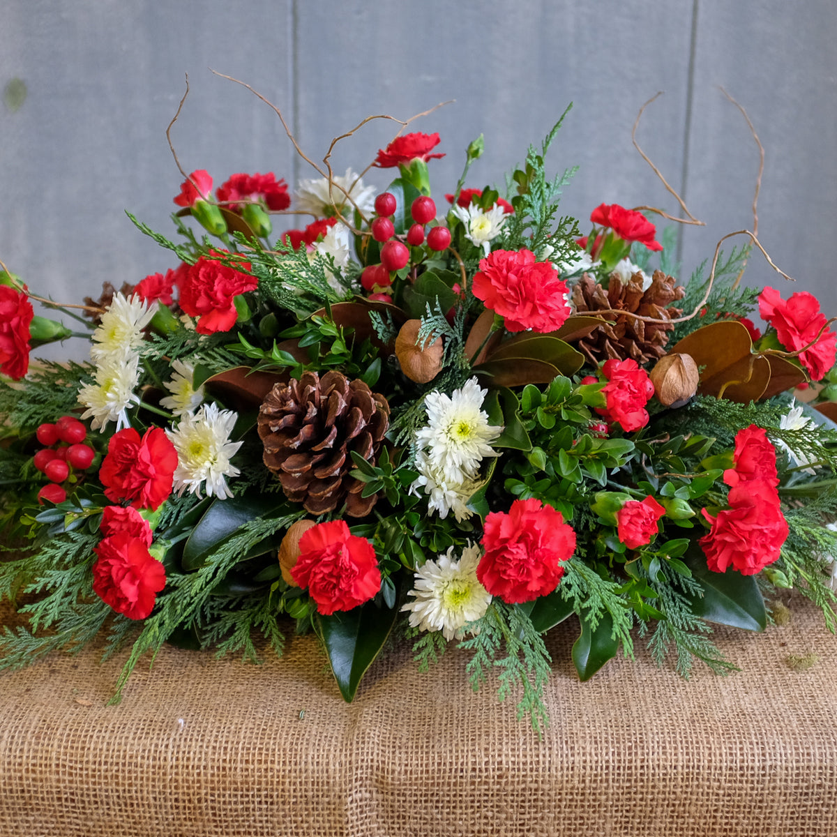 https://www.michlers.com/cdn/shop/products/Carnation-Christmas-Centerpiece.jpg?crop=center&height=1200&v=1545408994&width=1200