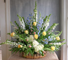 flower basket with roses, hydrangea, larkspur, and stock by Michler's Florist in Lexington, KY