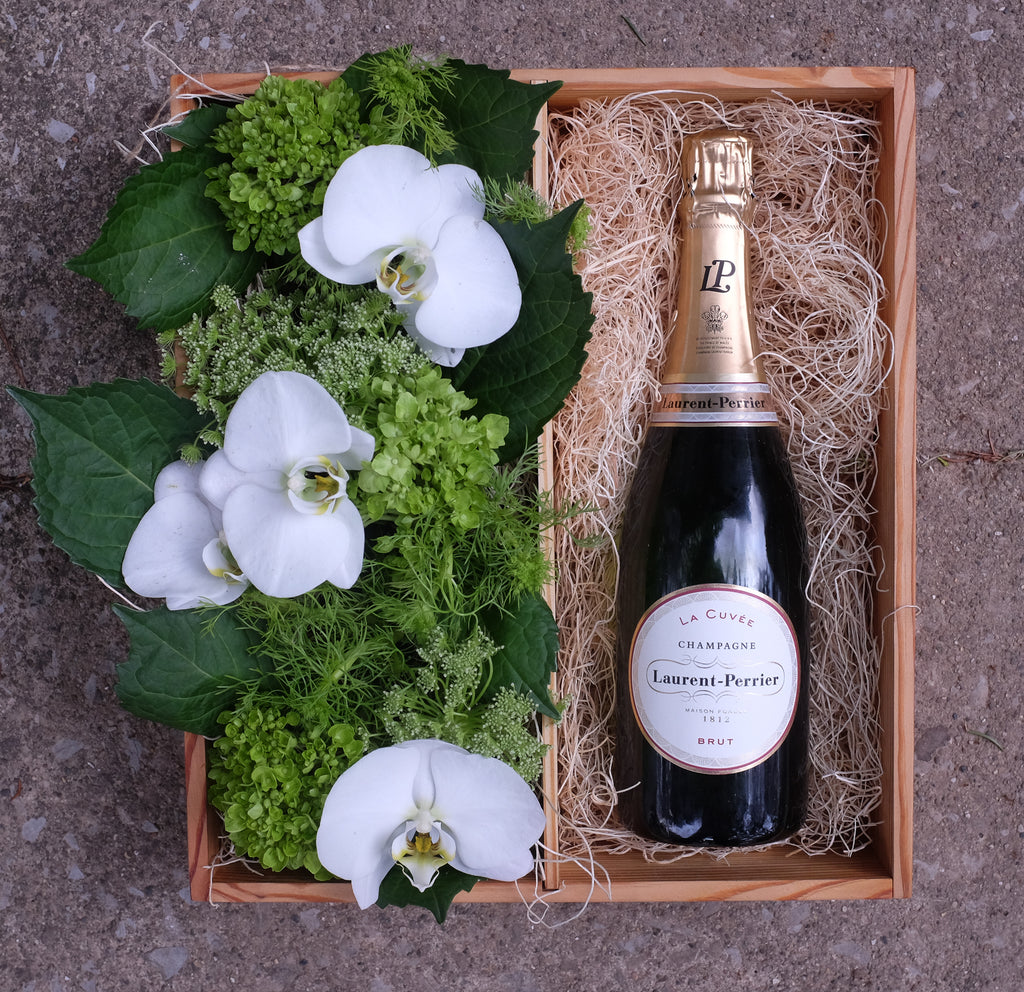 Champagne wine gift crate with orchid flowers