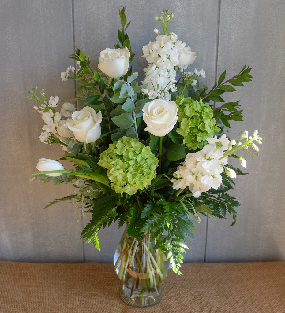 White and green flower bouquet by Michler Florist.