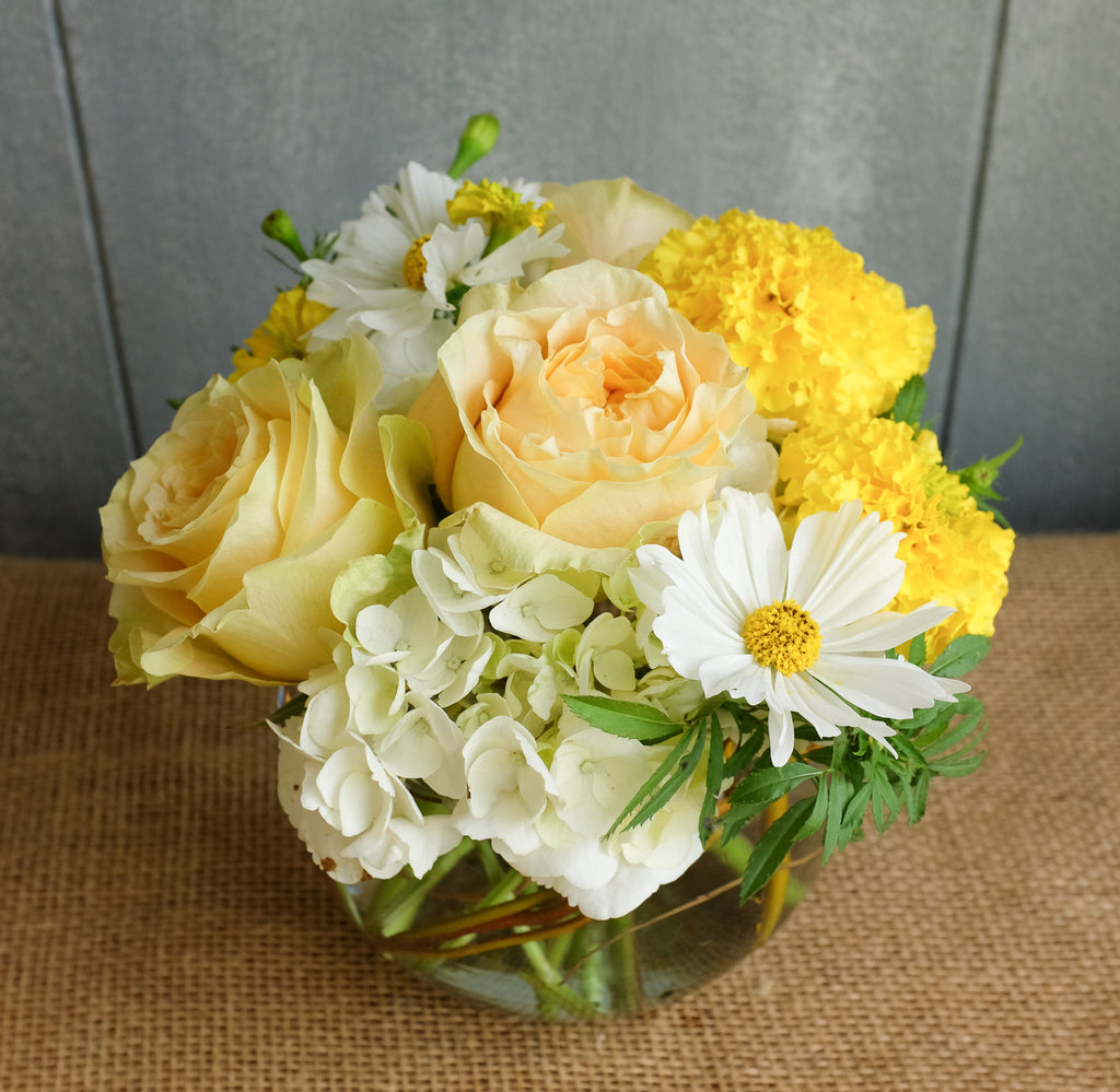 Yellow and white flower bouquet by Michler florist.