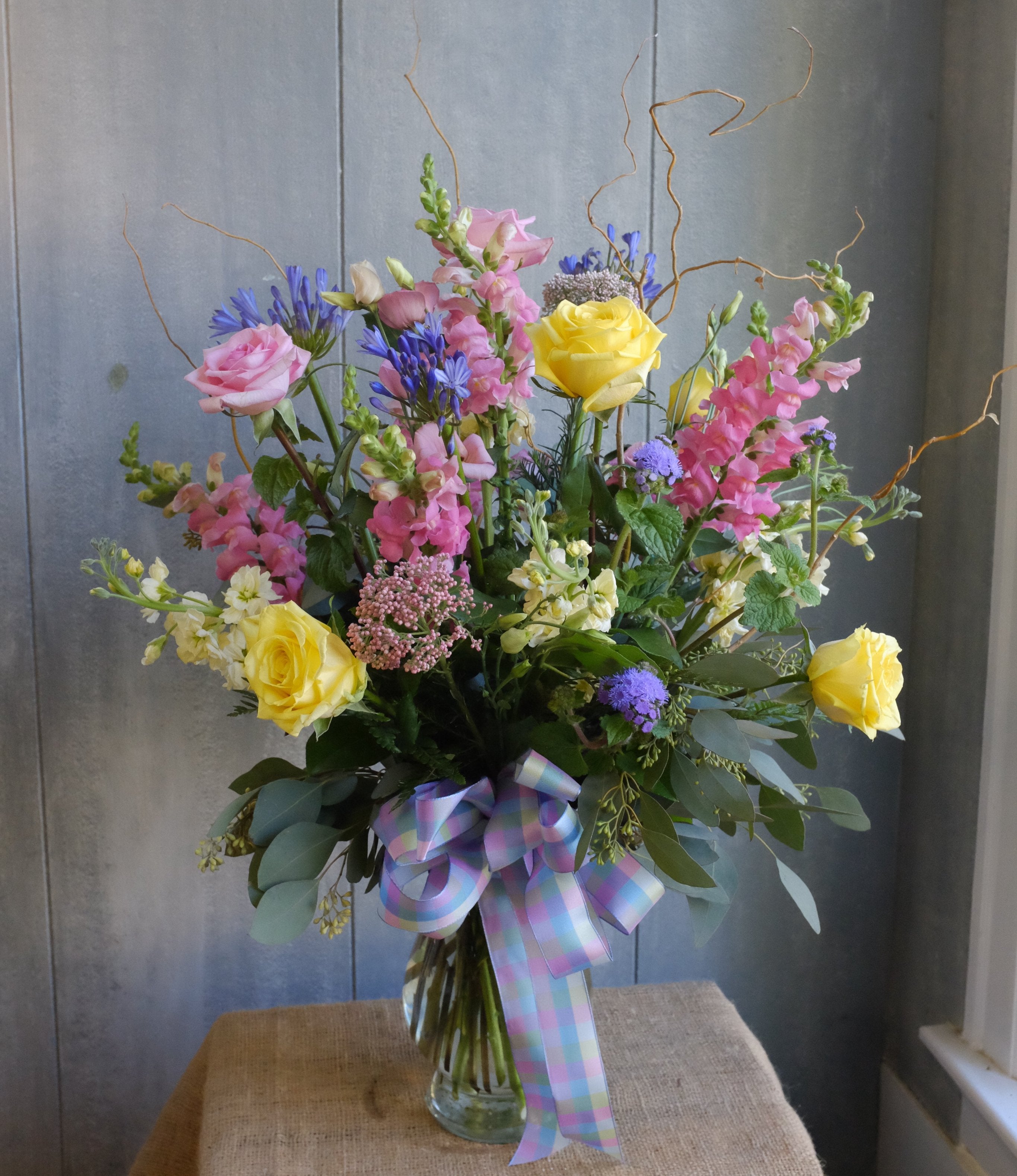 Madeley: Garden Vase with roses, agapanthus, rice flower, and larkspur | Michler's Florist 