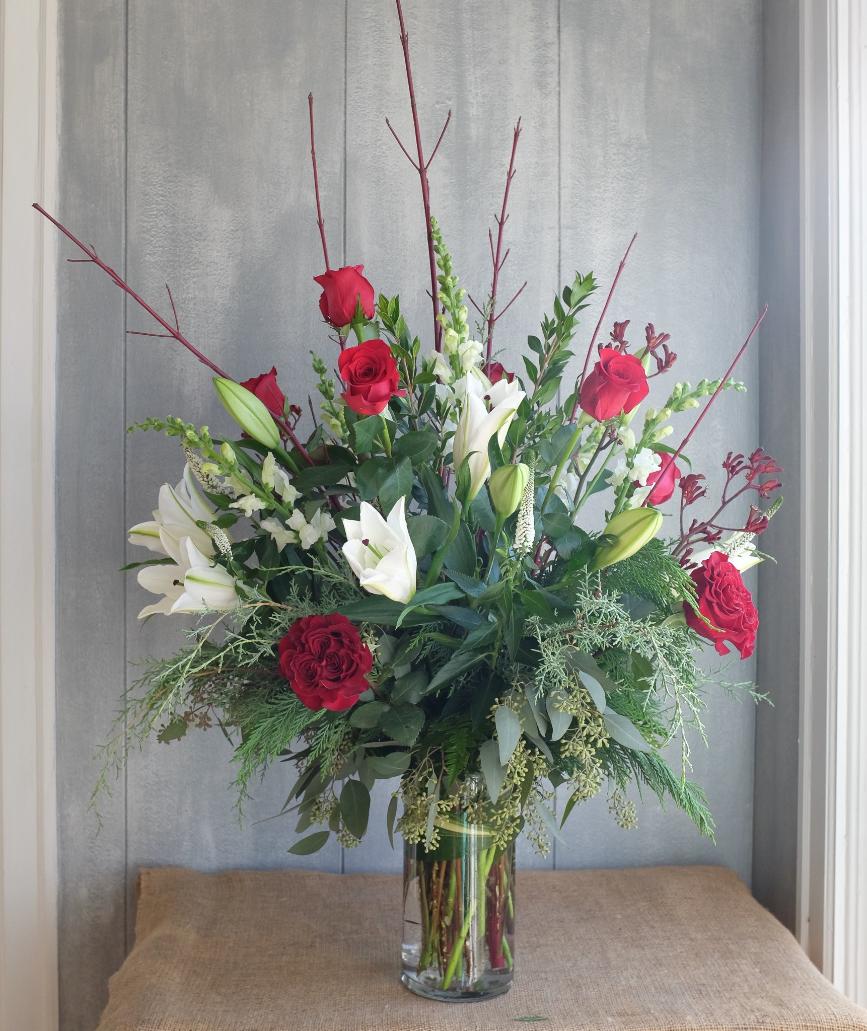 Red christmas floral arrangements deals