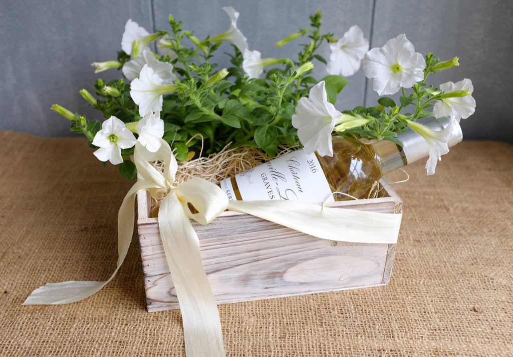 White petunias and white wine gift crate Michler's Florist