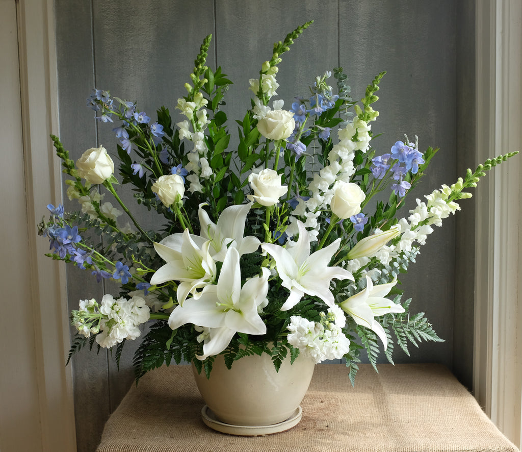 Blue and white floral spray in a glaze pot