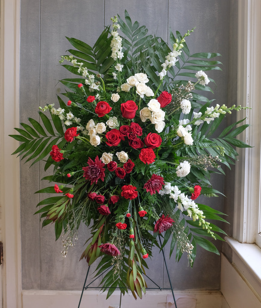 floral sympathy spray with roses, carnations, mums, and stock by Michler's Florist in Lexington, KY