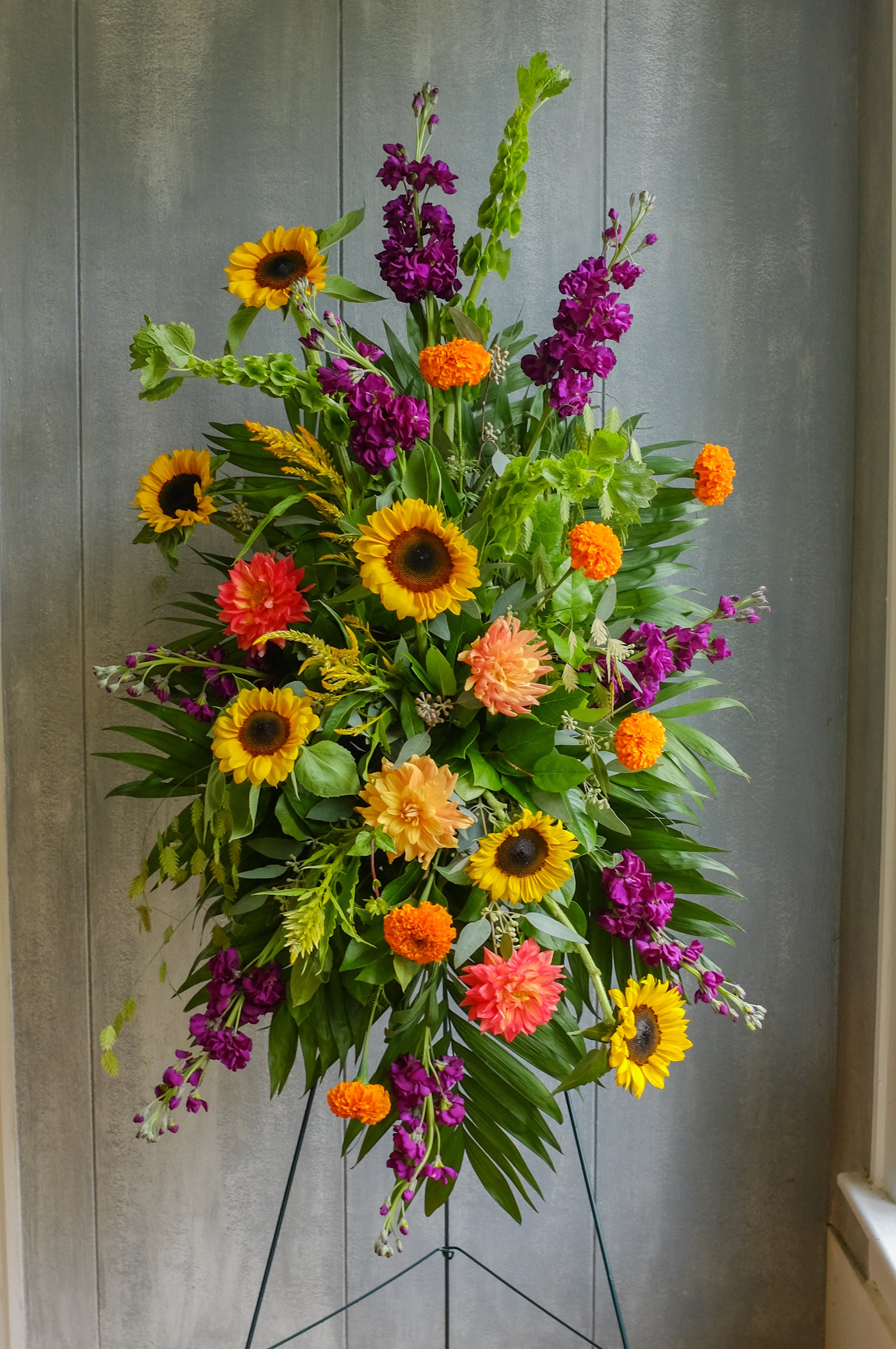 Sunflower Standing Spray for Funeral designed by Michler’s Florist
