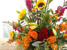 Fall Floral Arrangement with sunflowers, safflowers, and celosia 