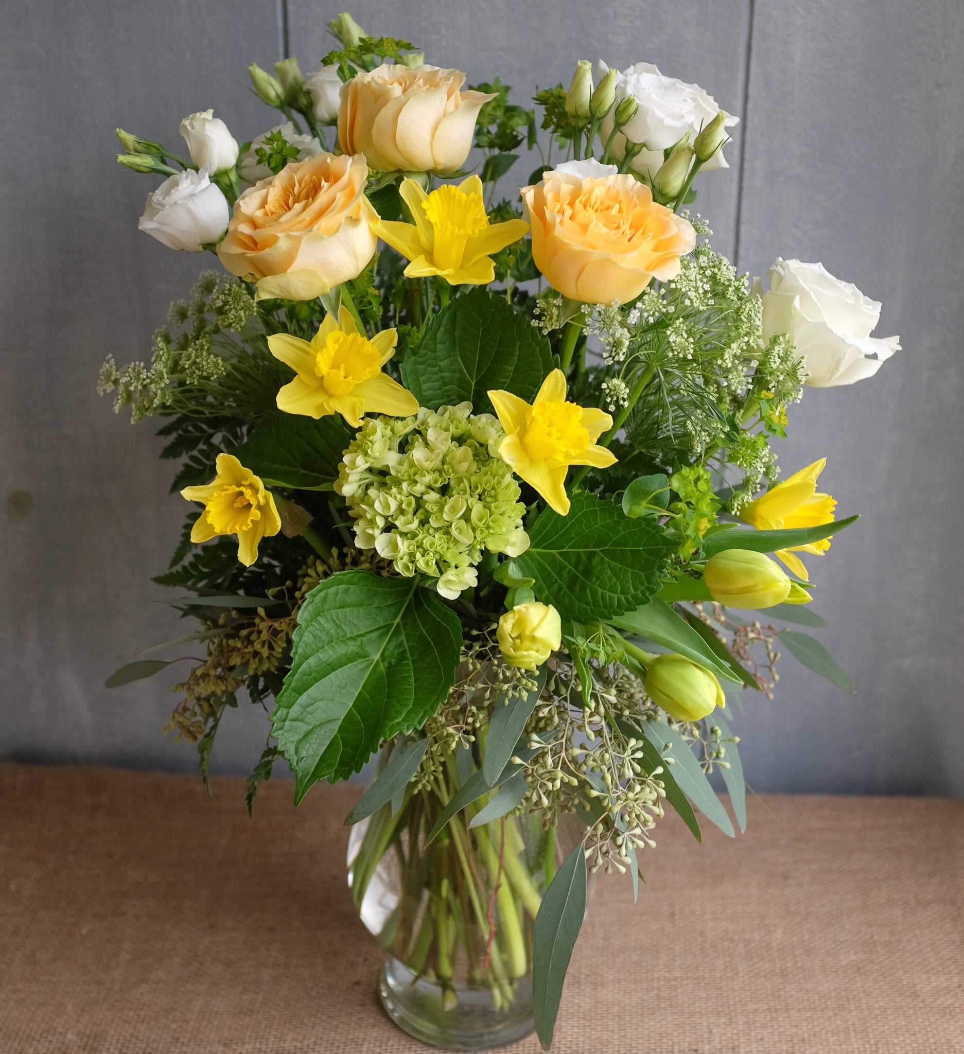 Elegant floral bouquet in white, yellow and green