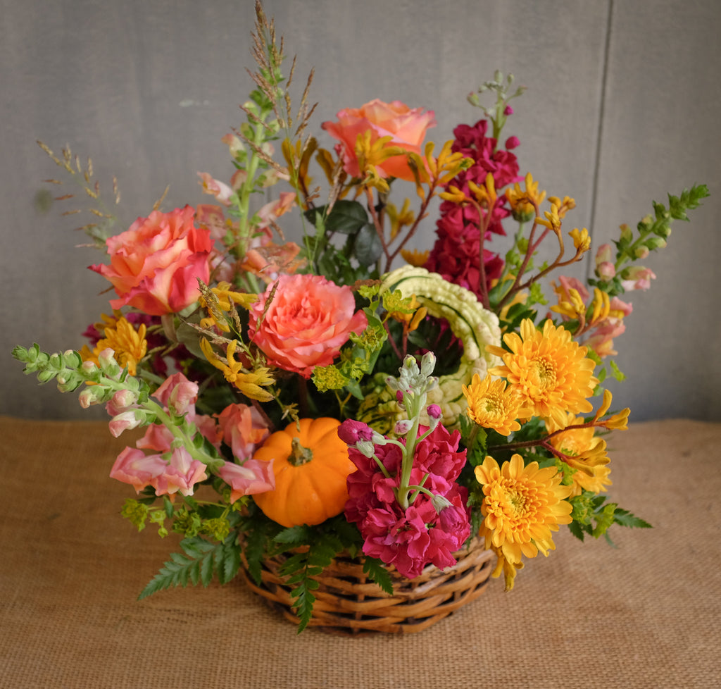 Fall Flower Basket with Miniature Pumpkins.