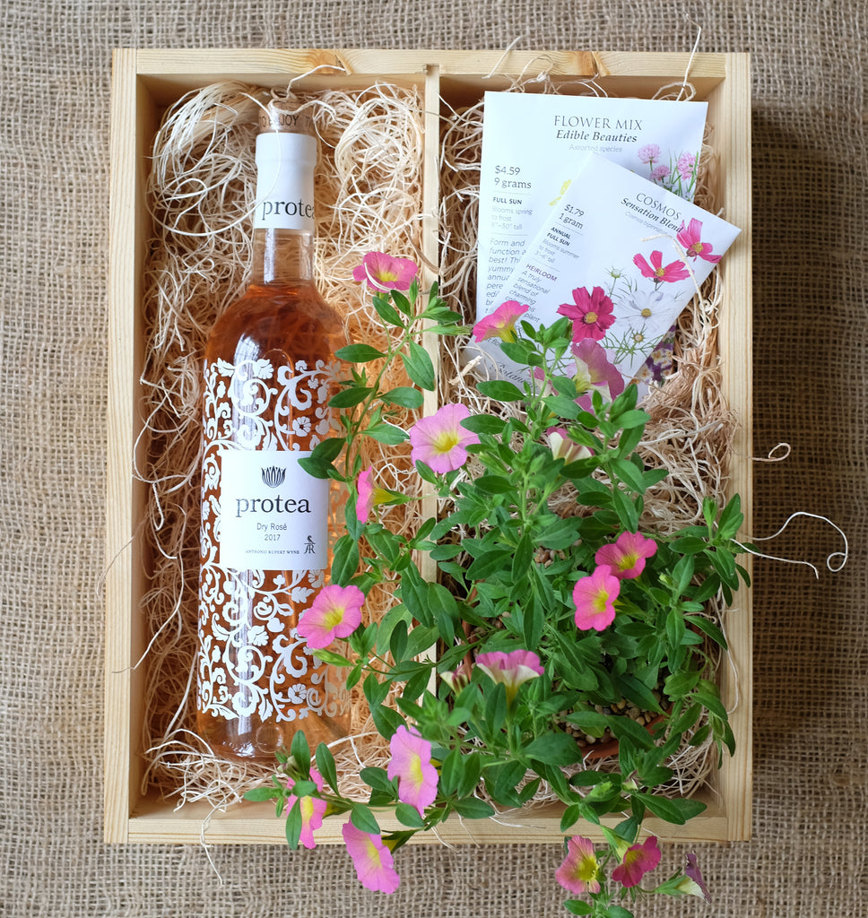 Wooden rose wine box with flowers and seeds