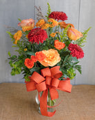 Warm colored fall flower bouquet.