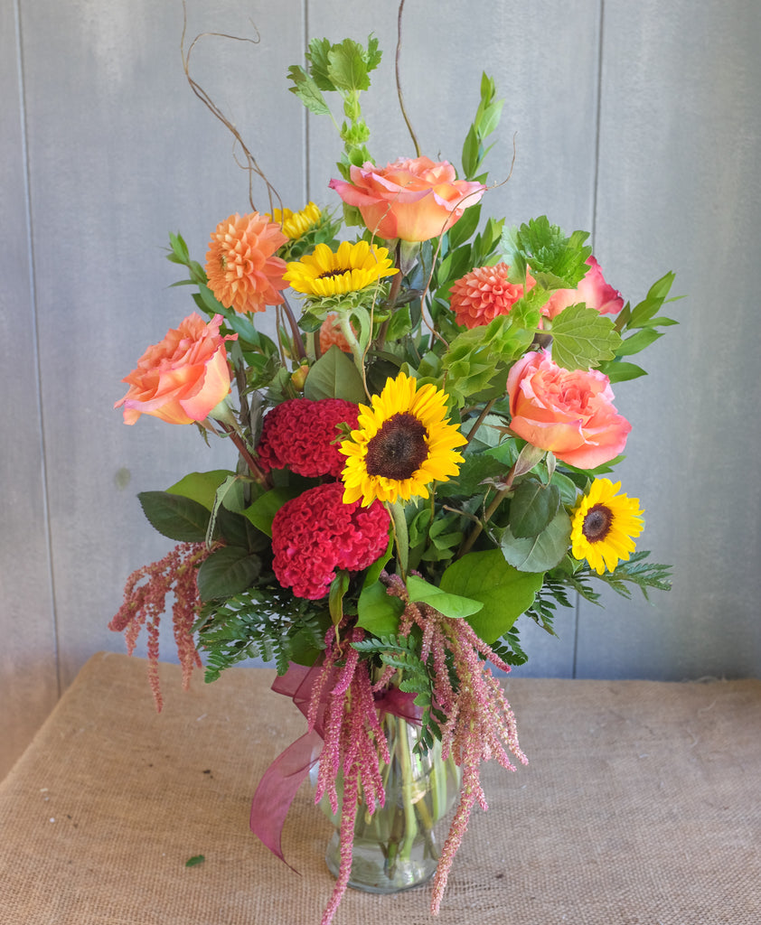 Bright and cheerful bouquet with sunflowers