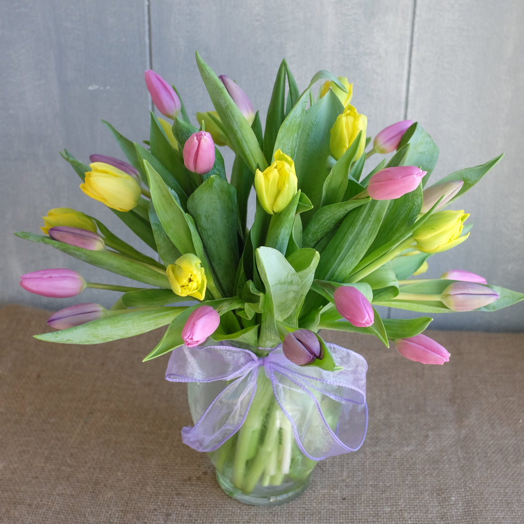 Flower bouquet of multi colored tulips.