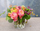 Malta: Flower Arrangement with roses, yarrow, asclepias, double tulips and astrantia | Michler's Florist