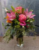 Miami Flower Arrangement with pink lilies and bicolor orange roses. Designed by Michler's in Lexington, KY