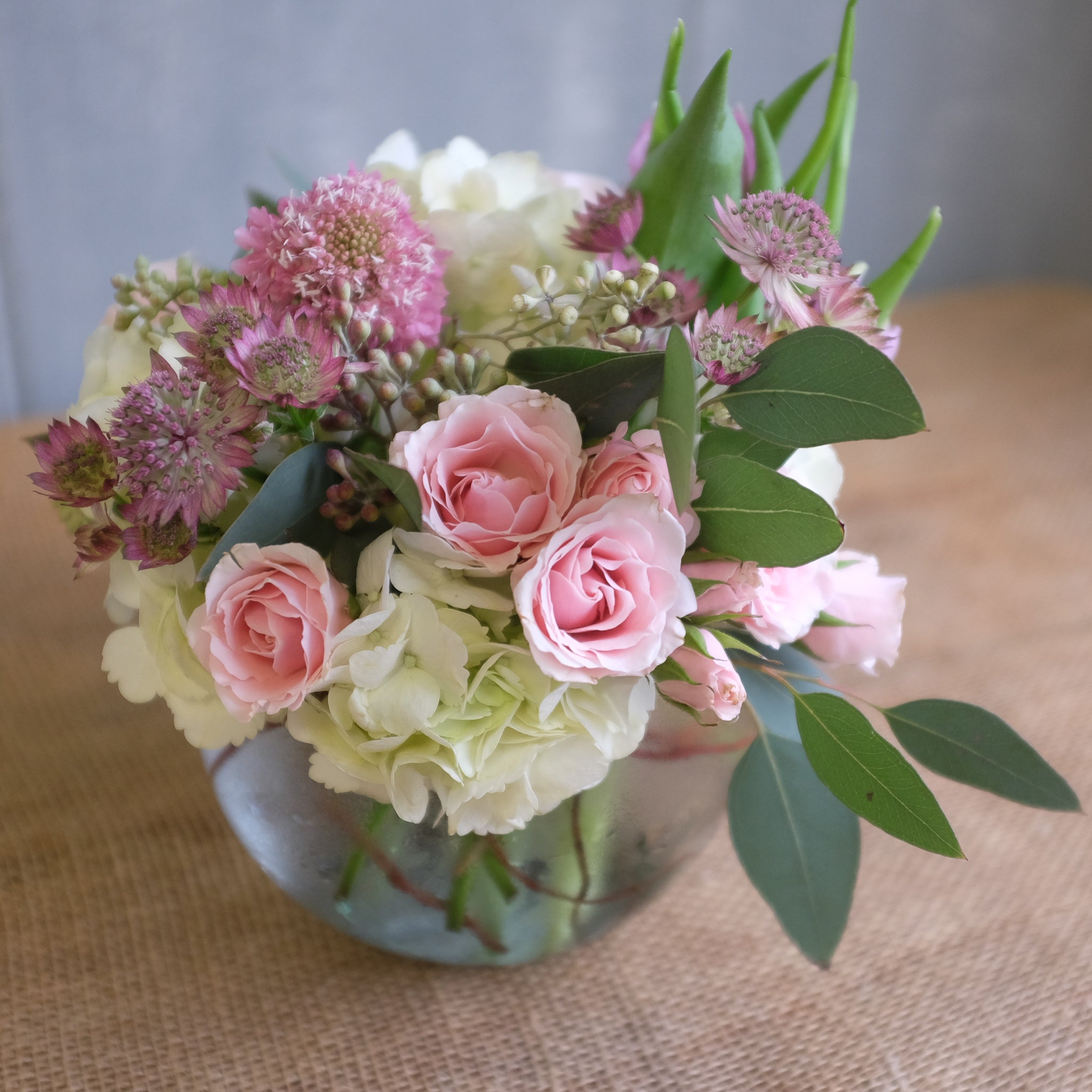Pink and white flower bouquet by Michlers Florist.