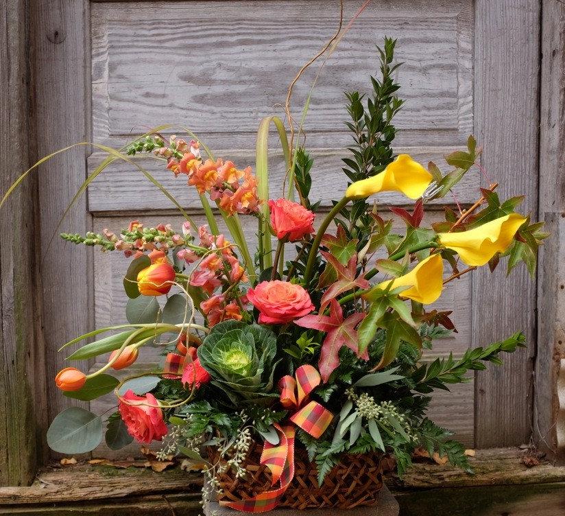 Sympathy Arrangement | Funeral Basket with Yellow Calla Lilies. Michler's Florist 