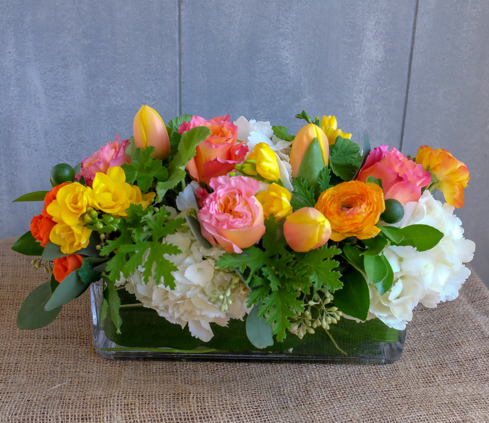 Octavia | Thanksgiving Centerpiece with Freesia, Blush Tulips, Ranunculus | Michler's Florist