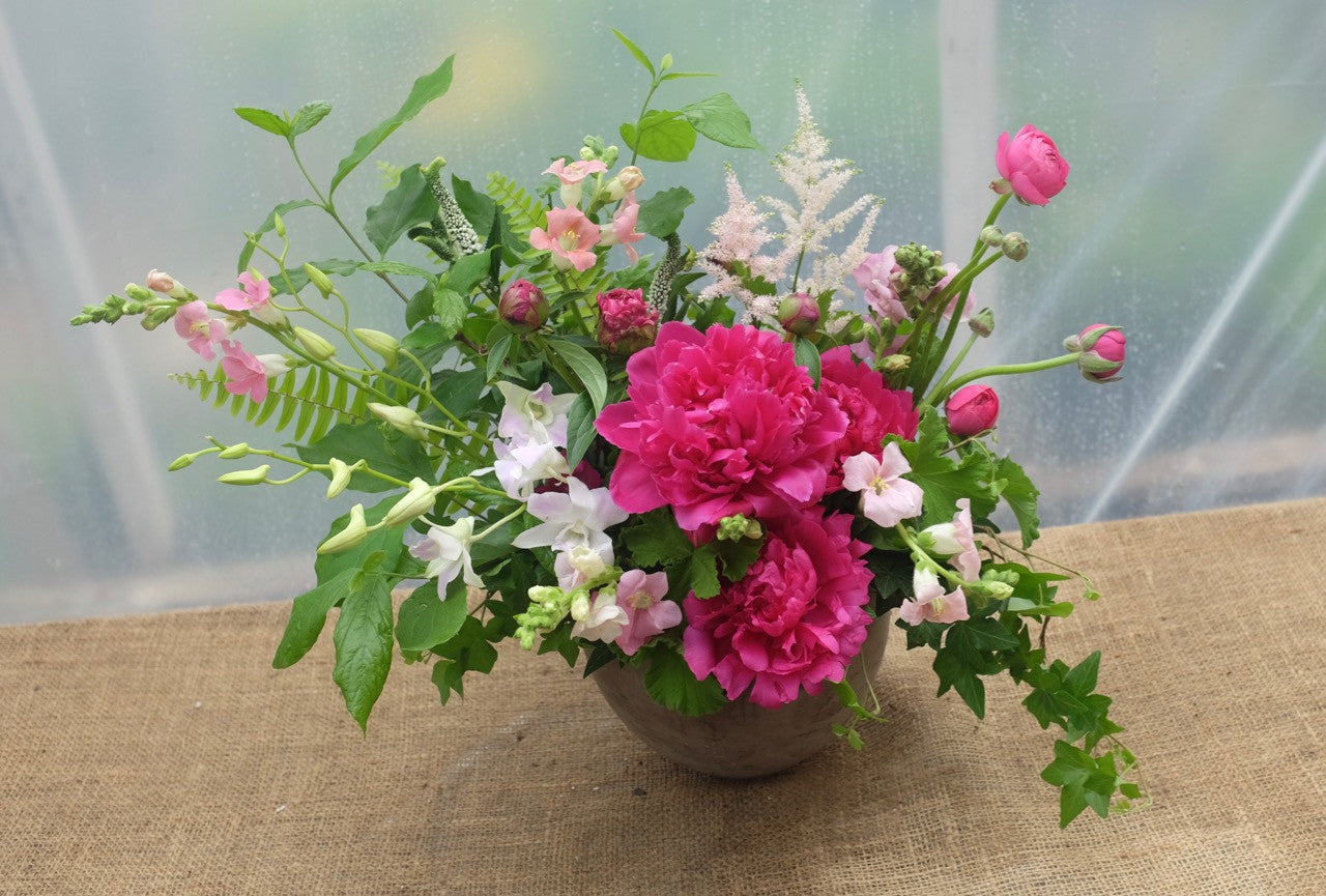 Pamplona: Garden flower design with Peonies, Astilbe, and Dendrobium Orchids 