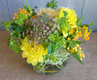 Lush Bouqet of bright garden flowers and textured foliage