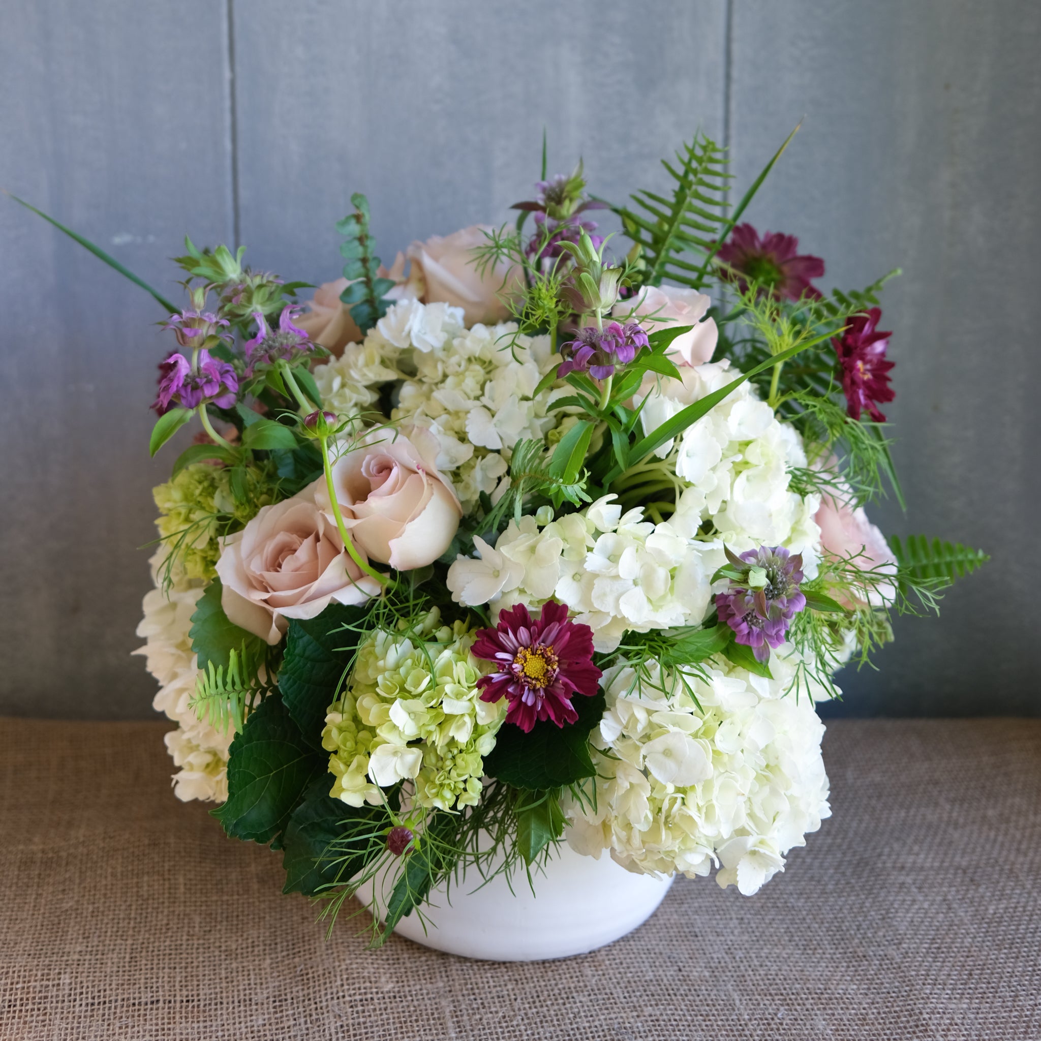 Large, compact arrangement in softer tones.