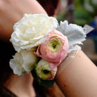 Wrist Corsage with Ranunculus and Roses | Michler's Florist