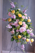 floral easel spray with roses, hydrangea, and stock by Michler's