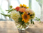 Flower arrangement with yellow and orange Dahlias and Sunflowers | Michler's Florist