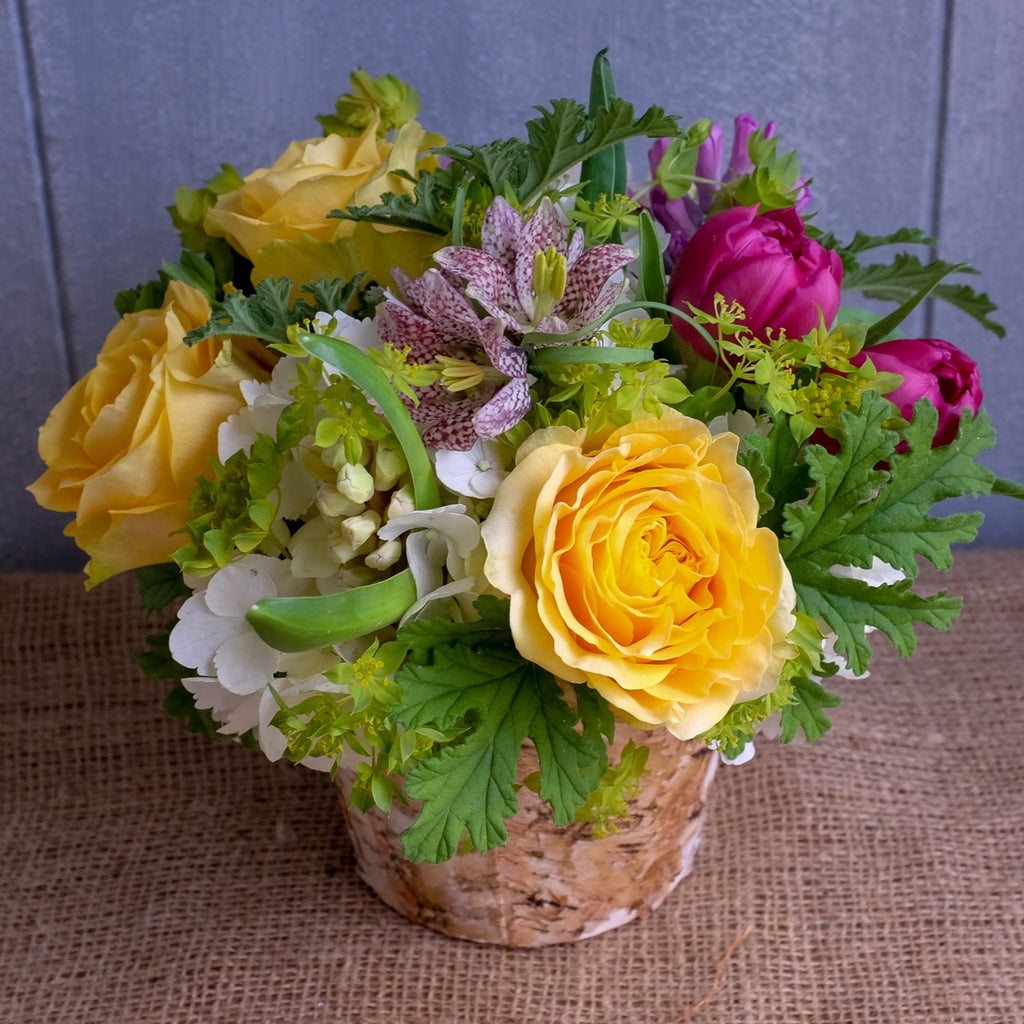 Shenandoah Flower Bouquet with Checkered Fritillaria, Double Tulips, and Scented Geranium Foliage by Michler's Florist