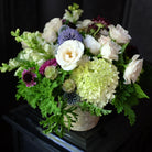 Flower design with Scabiosa, Scented Geraniums, Globe thistle | Michler's Florist
