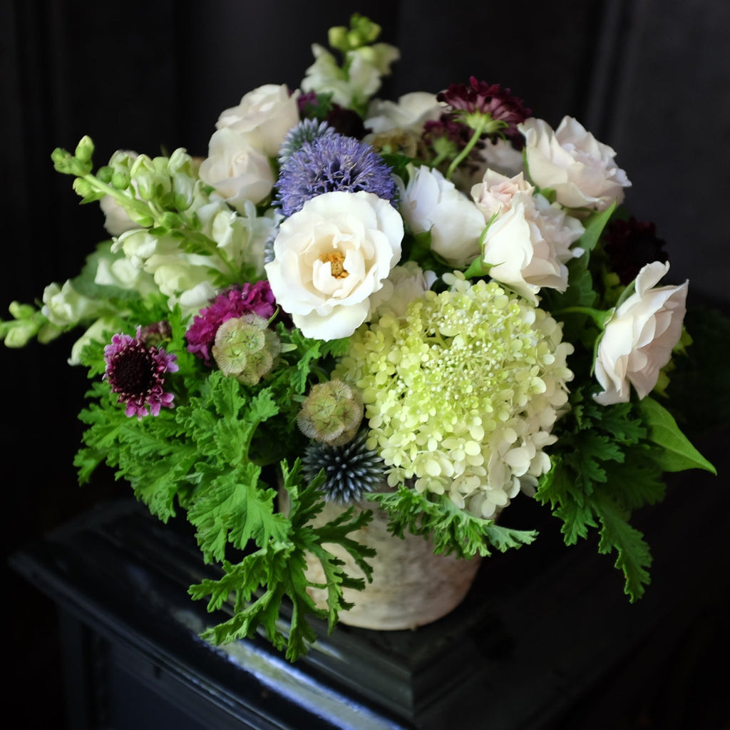 Flower design with Scabiosa, Scented Geraniums, Globe thistle | Michler's Florist