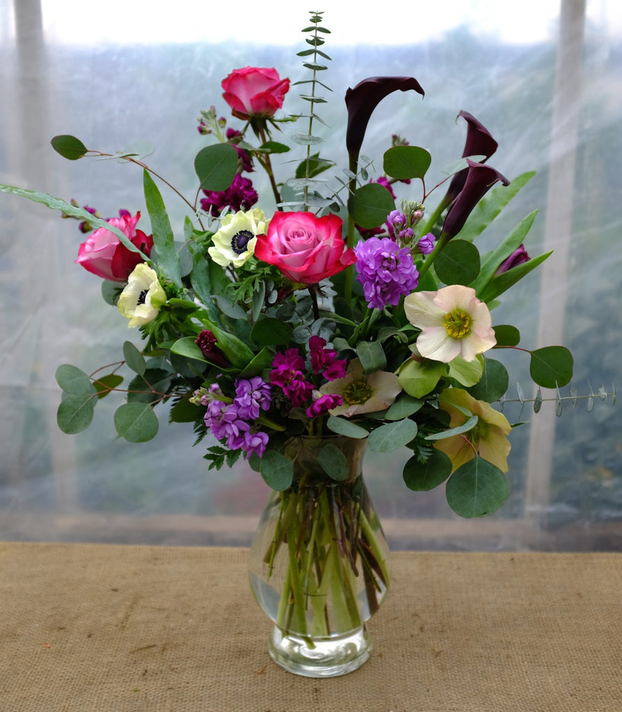 Fontaine: Floral Arrangement with Anemones, Calla Lilies, Roses, Stock. Designed by Michler's Florist in Lexington, KY