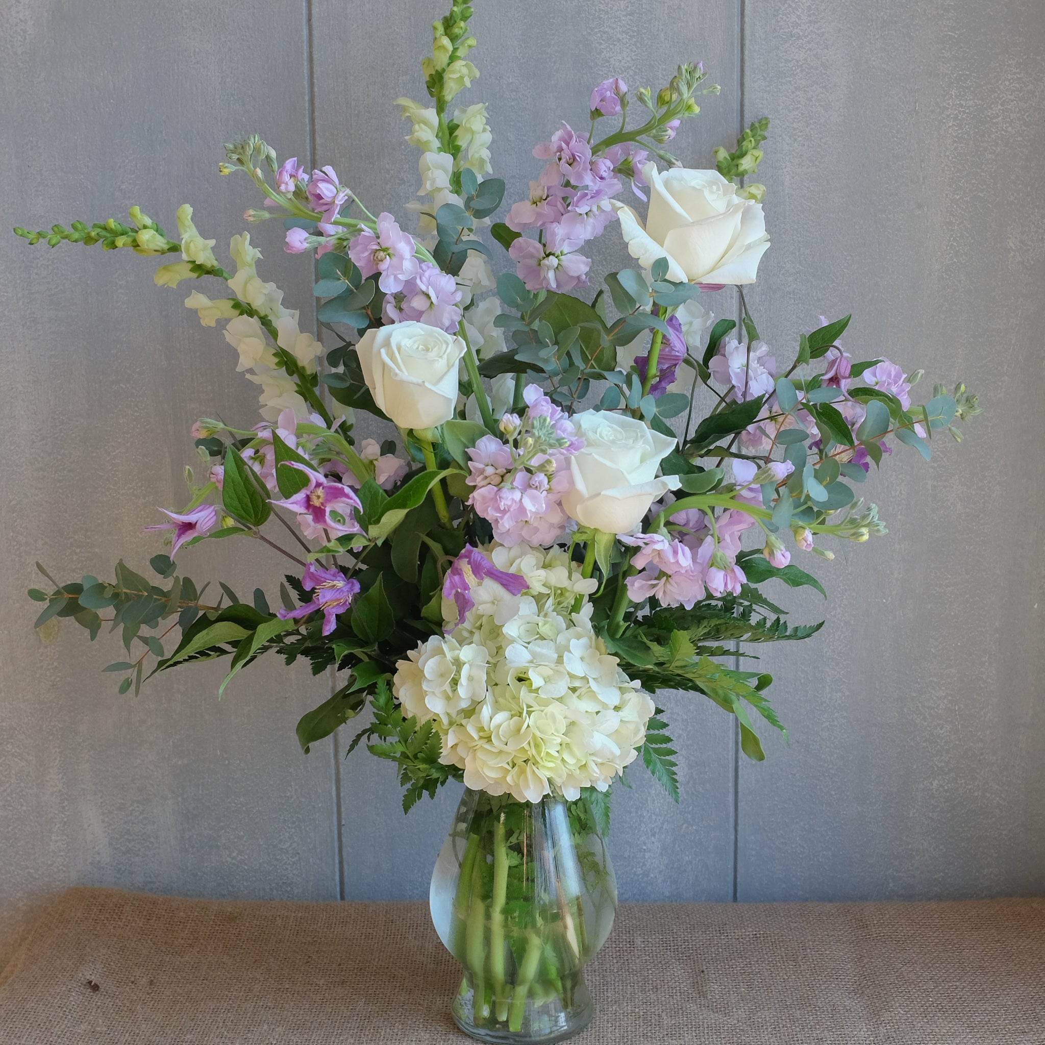 Lavender and white flower bouquet by Michler Florist.