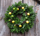 Williamsburg Wreath | Christmas wreath with fresh fruit by Michler's Florist 