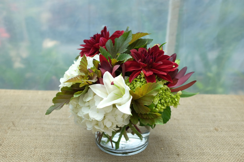 Winnipeg: Flower design with burgundy Dahlias, white hydrangea, and lilies | Michler's Florist